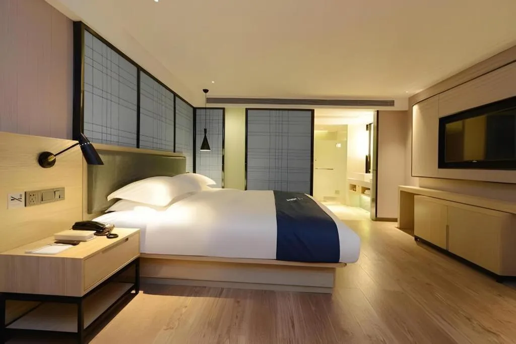 Bed in Echarm Hotel Guiyang North High-speed Railway Station