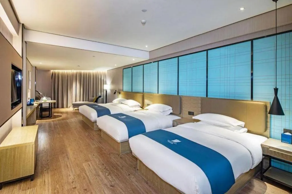 Bed in Echarm Hotel Guilin Railway Station the MixC