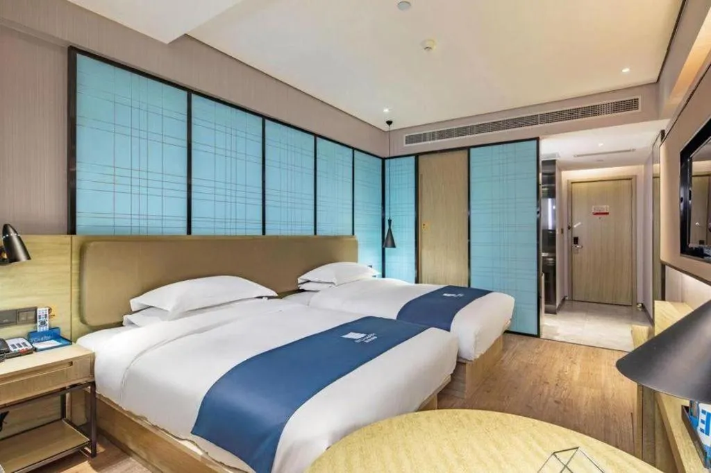 Bed in Echarm Hotel Guilin Railway Station the MixC