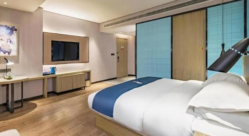 Bed in Echarm Hotel Guilin Railway Station the MixC