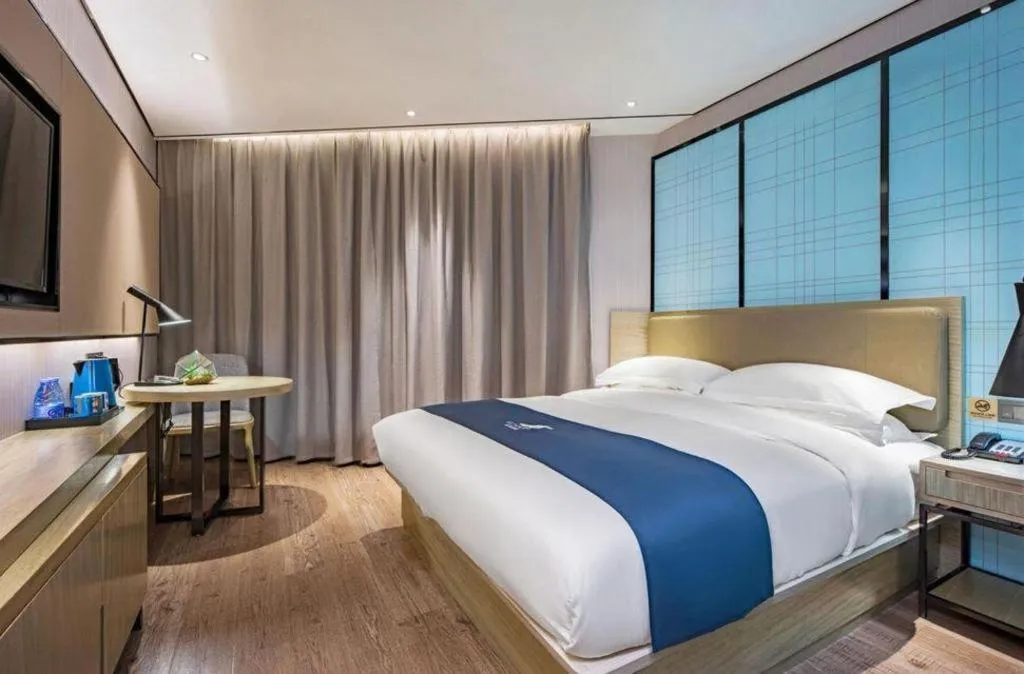 Bed in Echarm Hotel Guilin Railway Station the MixC