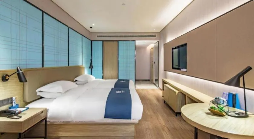 Bed in Echarm Hotel Guilin Railway Station the MixC
