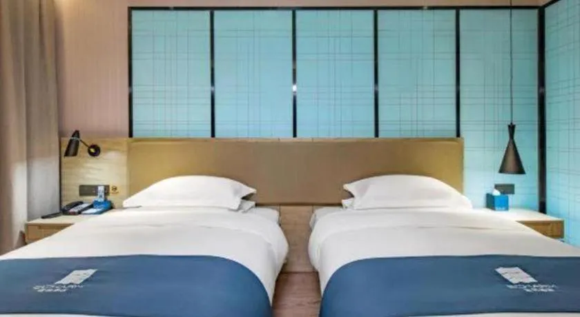 Bed in Echarm Hotel Guilin Railway Station the MixC