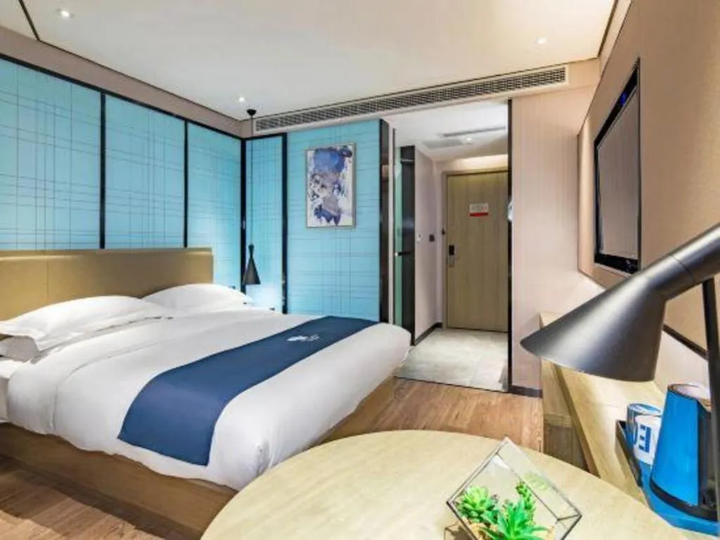 Bed in Echarm Hotel Guilin Railway Station the MixC