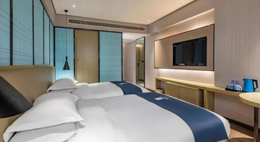 Bed in Echarm Hotel Guilin Railway Station the MixC