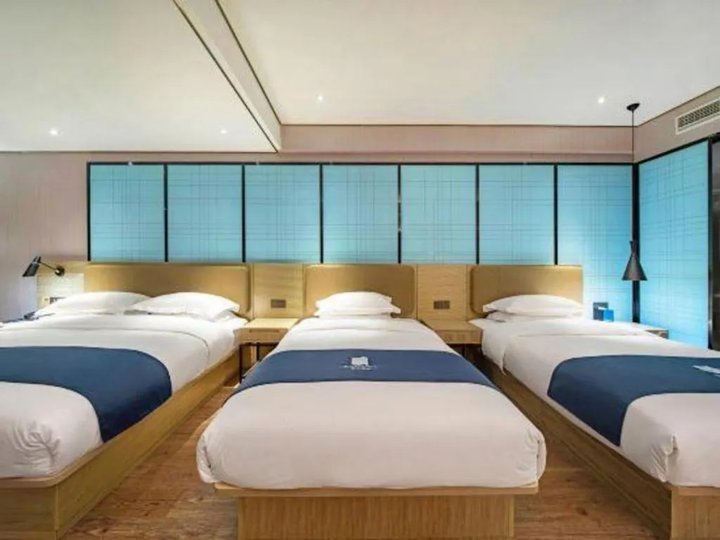 Bed in Echarm Hotel Guilin Railway Station the MixC