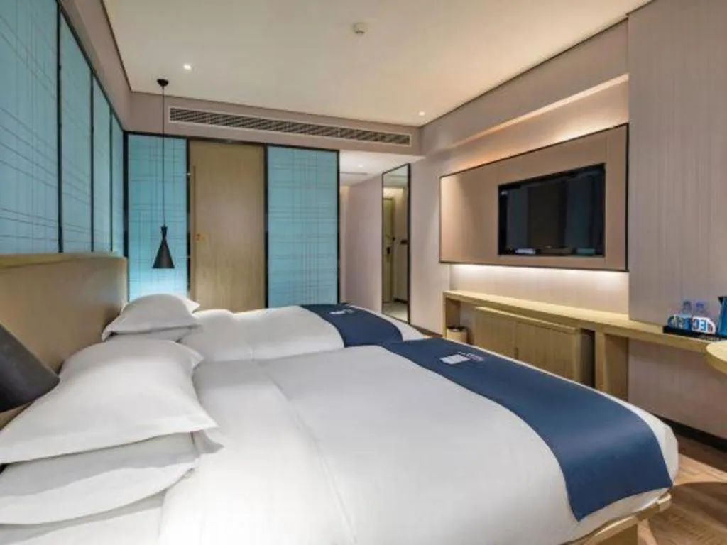 Bed in Echarm Hotel Guilin Railway Station the MixC