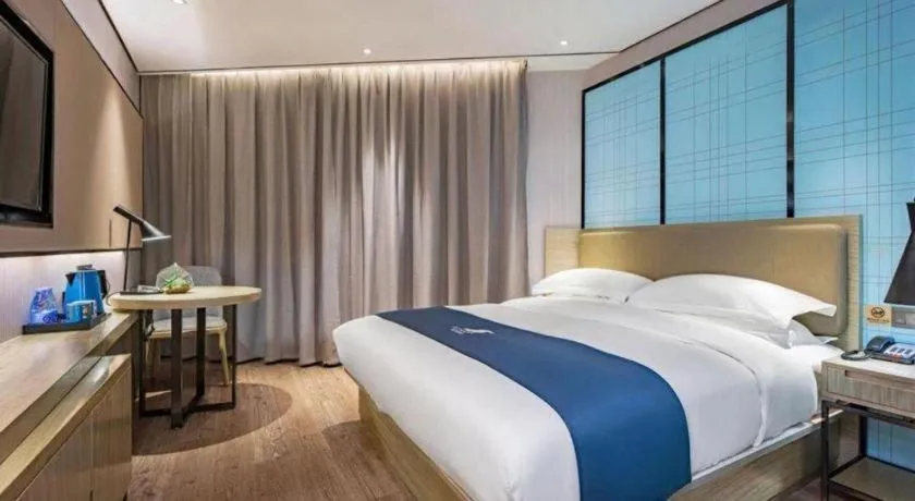 Bed in Echarm Hotel Guilin Railway Station the MixC