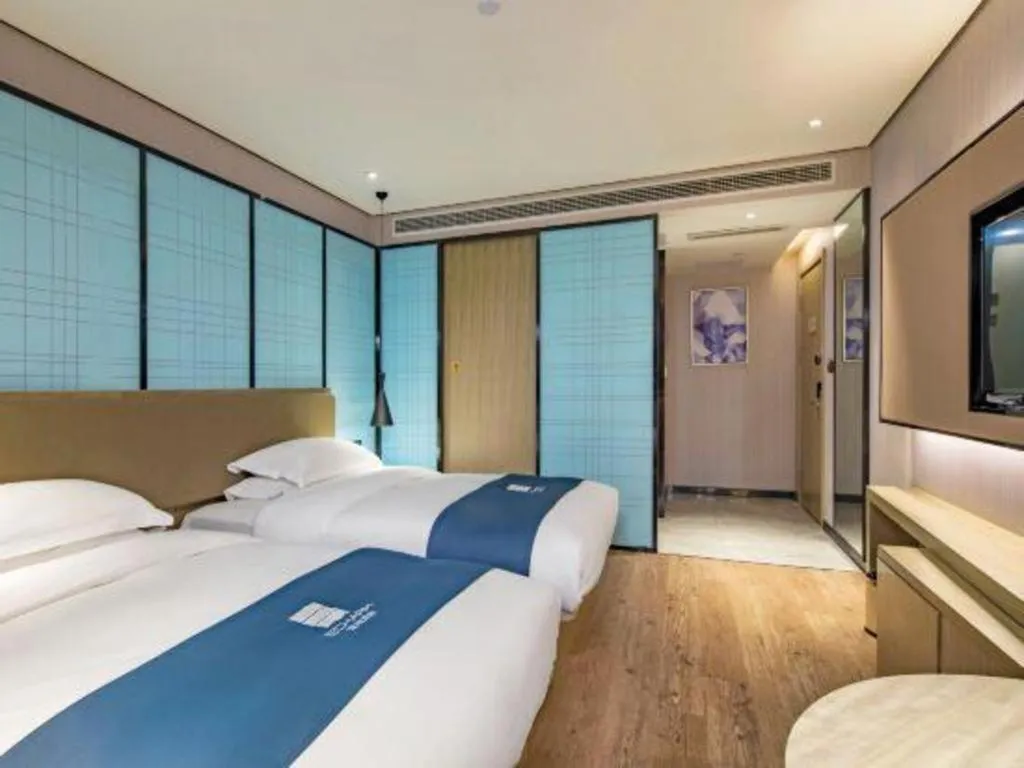 Bed in Echarm Hotel Guilin Railway Station the MixC