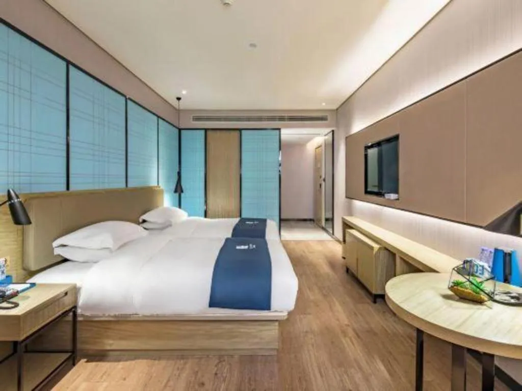 Bed in Echarm Hotel Guilin Railway Station the MixC