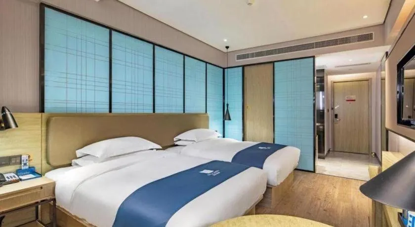 Bed in Echarm Hotel Guilin Railway Station the MixC