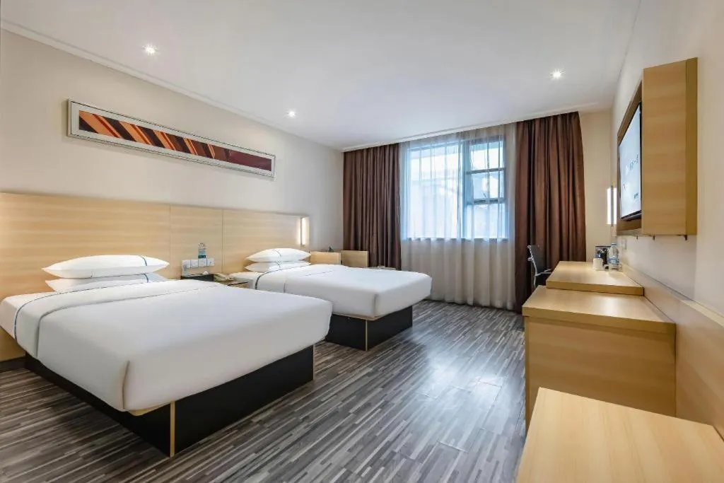 Bed in City Comfort Inn Dongguan Shijie Jiarong Shopping Plaza