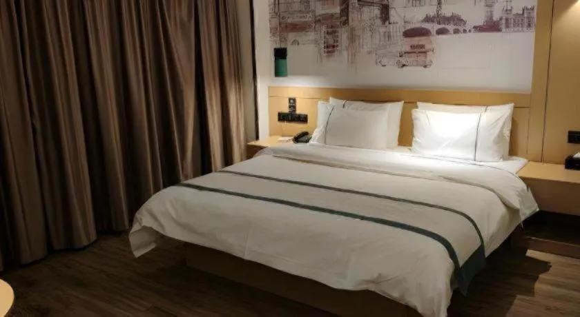 Bed in City Comfort Inn Loudi Sports Center