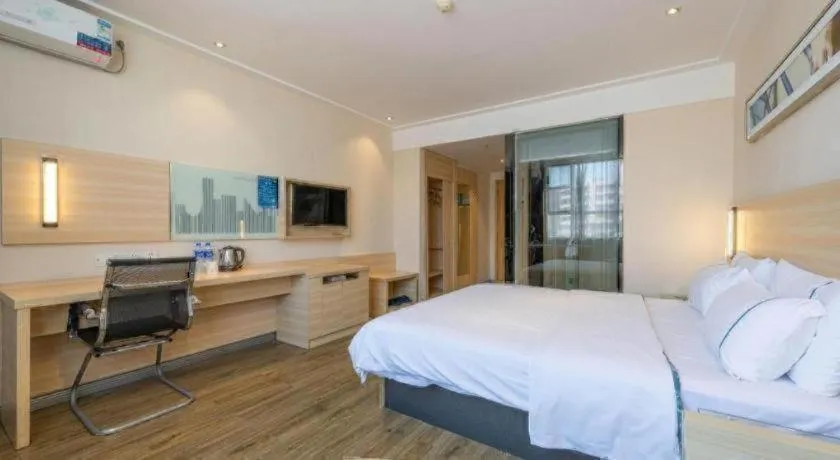 Bed in City Comfort Inn Dongguan Shilong Huixing Commercial Center