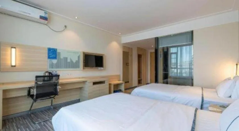 Bed in City Comfort Inn Dongguan Shilong Huixing Commercial Center