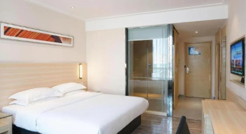 Bed in City Comfort Inn Dongguan Shilong Huixing Commercial Center