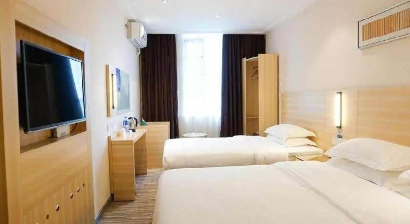 Bed in City Comfort Inn Dongguan Shilong Huixing Commercial Center