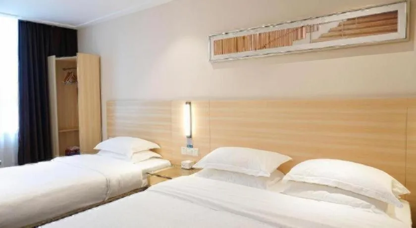 Bed in City Comfort Inn Dongguan Shilong Huixing Commercial Center