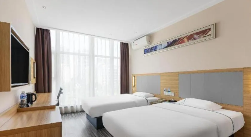 Bed in City Comfort Inn Dongguan Shilong Huixing Commercial Center