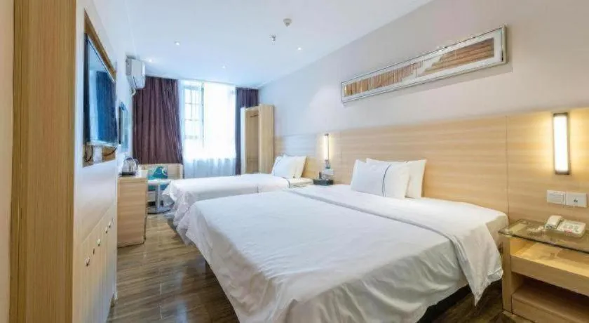 Bed in City Comfort Inn Dongguan Shilong Huixing Commercial Center