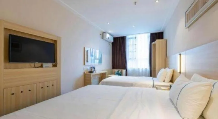 Bed in City Comfort Inn Dongguan Shilong Huixing Commercial Center