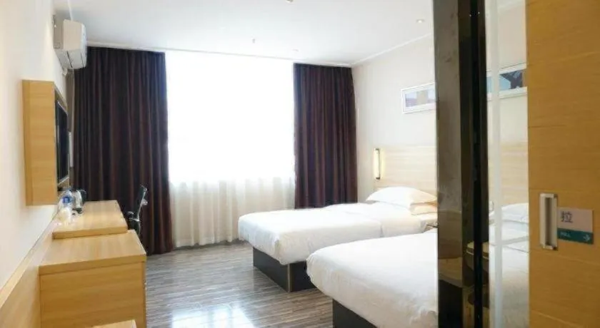 Bed in City Comfort Inn Dongguan Shilong Huixing Commercial Center