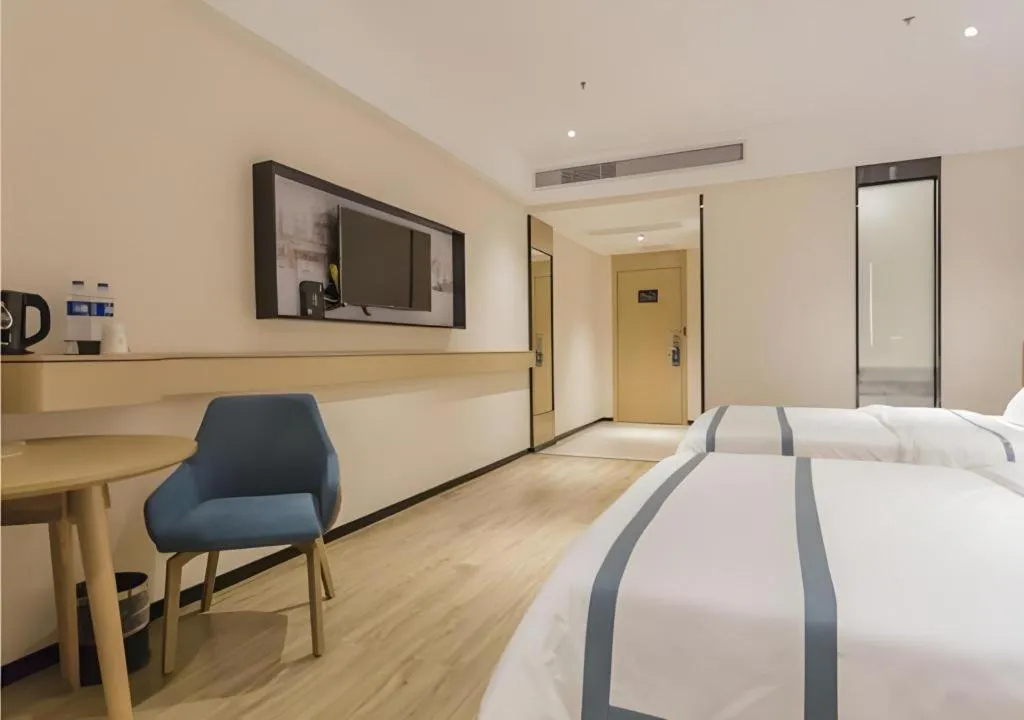 Bed in City Comfort Inn Foshan Shishan Square