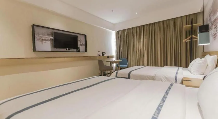 Bed in City Comfort Inn Foshan Shishan Square