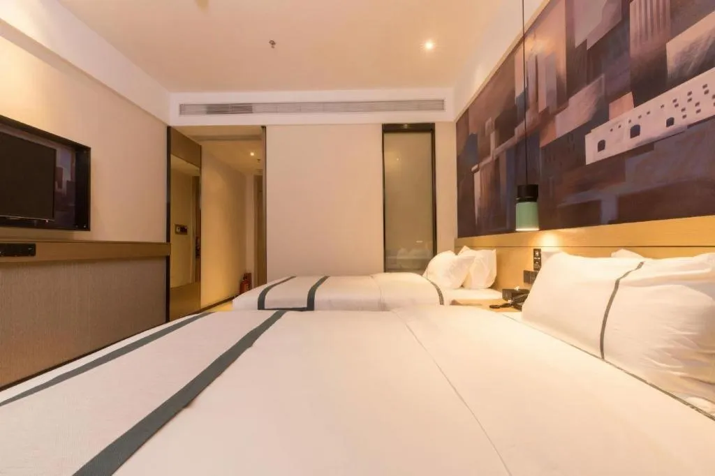 Bed in City Comfort Inn Foshan Shishan Square