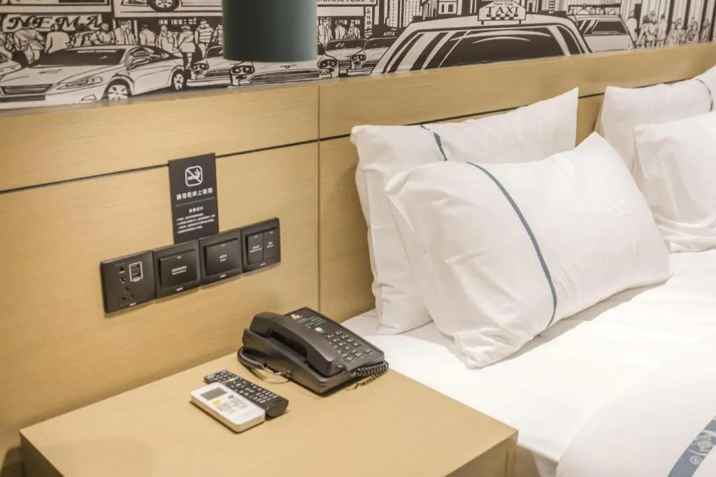 Bed in City Comfort Inn Foshan Shishan Square