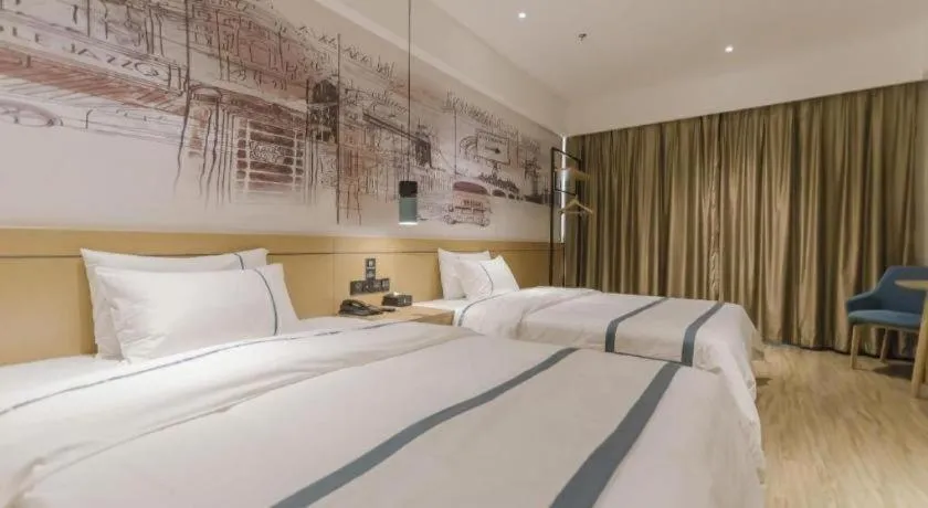 Bed in City Comfort Inn Foshan Shishan Square