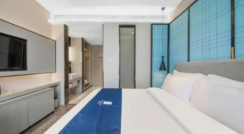 Bed in Echarm Hotel Tai'an Taishan Tianwai Village Hongmen