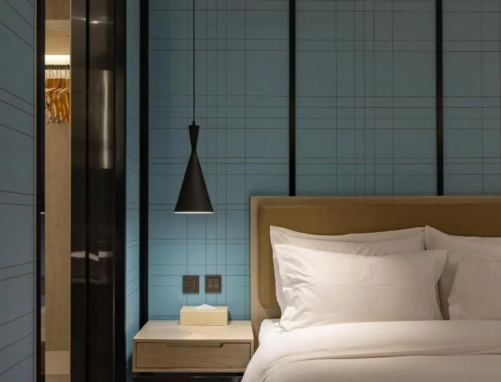 Bed in Echarm Hotel Tai'an Taishan Tianwai Village Hongmen