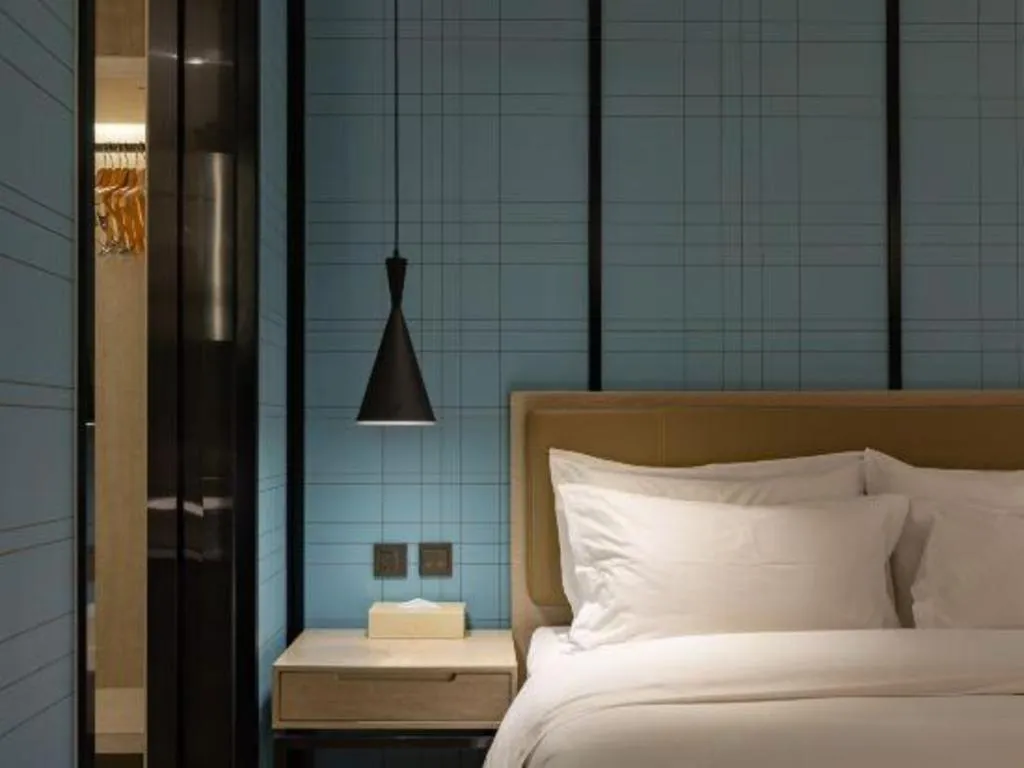 Bed in Echarm Hotel Tai'an Taishan Tianwai Village Hongmen