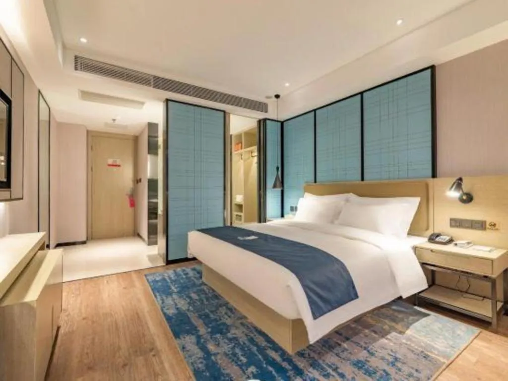 Bed in Echarm Hotel Tai'an Taishan Tianwai Village Hongmen