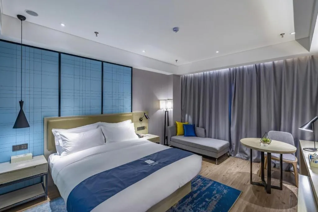 Bed in Echarm Hotel Tai'an Taishan Tianwai Village Hongmen