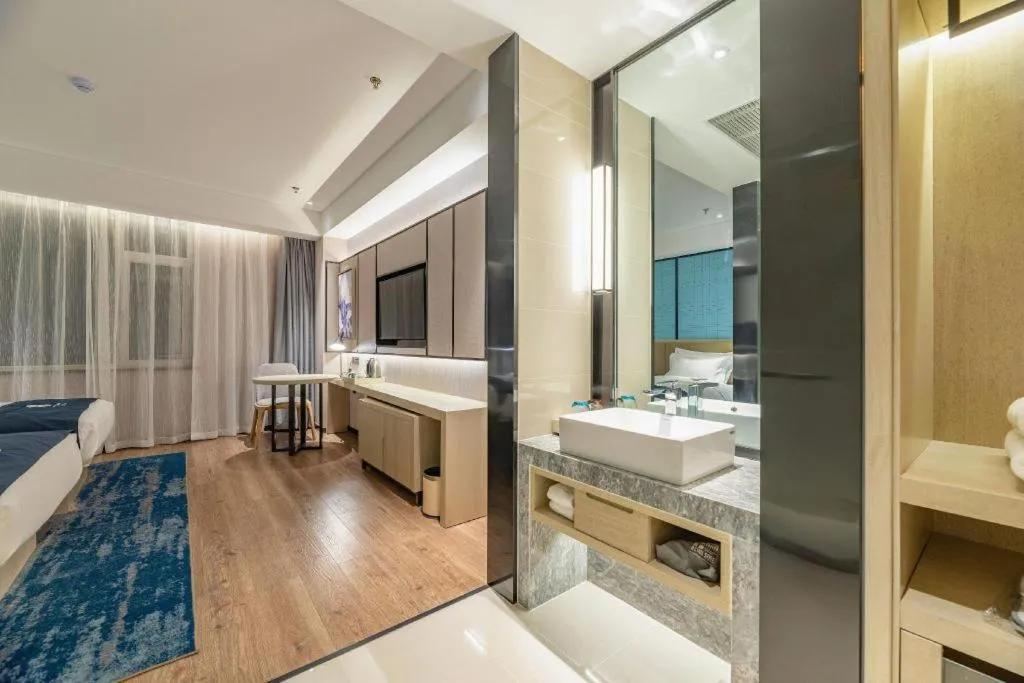 Bed in Echarm Hotel Tai'an Taishan Tianwai Village Hongmen