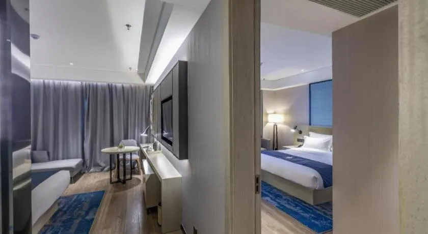 Bed in Echarm Hotel Tai'an Taishan Tianwai Village Hongmen