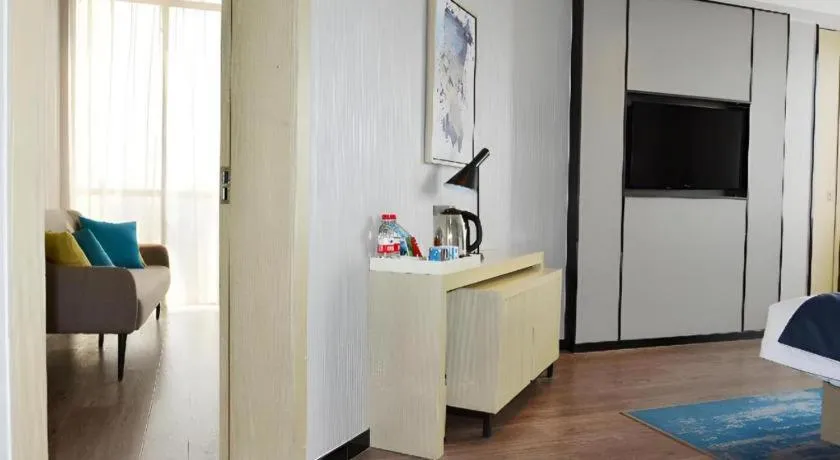 Bed in Echarm Hotel Tai'an Taishan Tianwai Village Hongmen