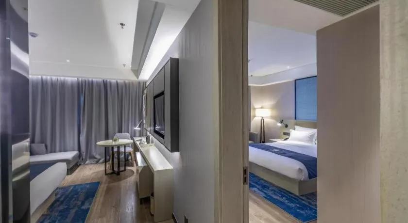 Bed in Echarm Hotel Tai'an Taishan Tianwai Village Hongmen