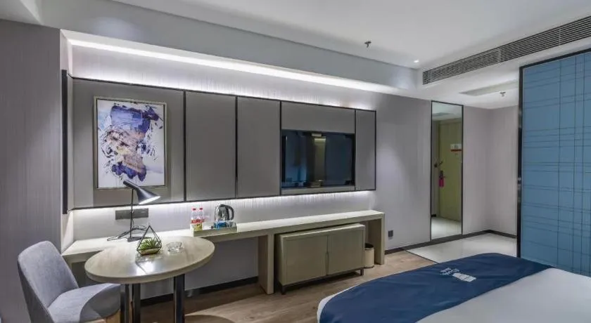 Bed in Echarm Hotel Tai'an Taishan Tianwai Village Hongmen