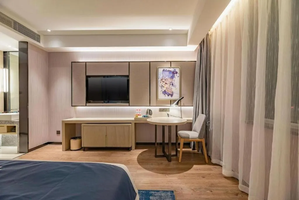 Bed in Echarm Hotel Tai'an Taishan Tianwai Village Hongmen