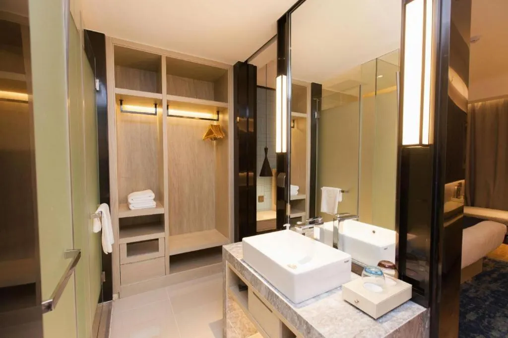 Bed in Echarm Hotel Tai'an Taishan Tianwai Village Hongmen