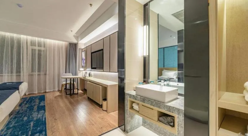 Bed in Echarm Hotel Tai'an Taishan Tianwai Village Hongmen