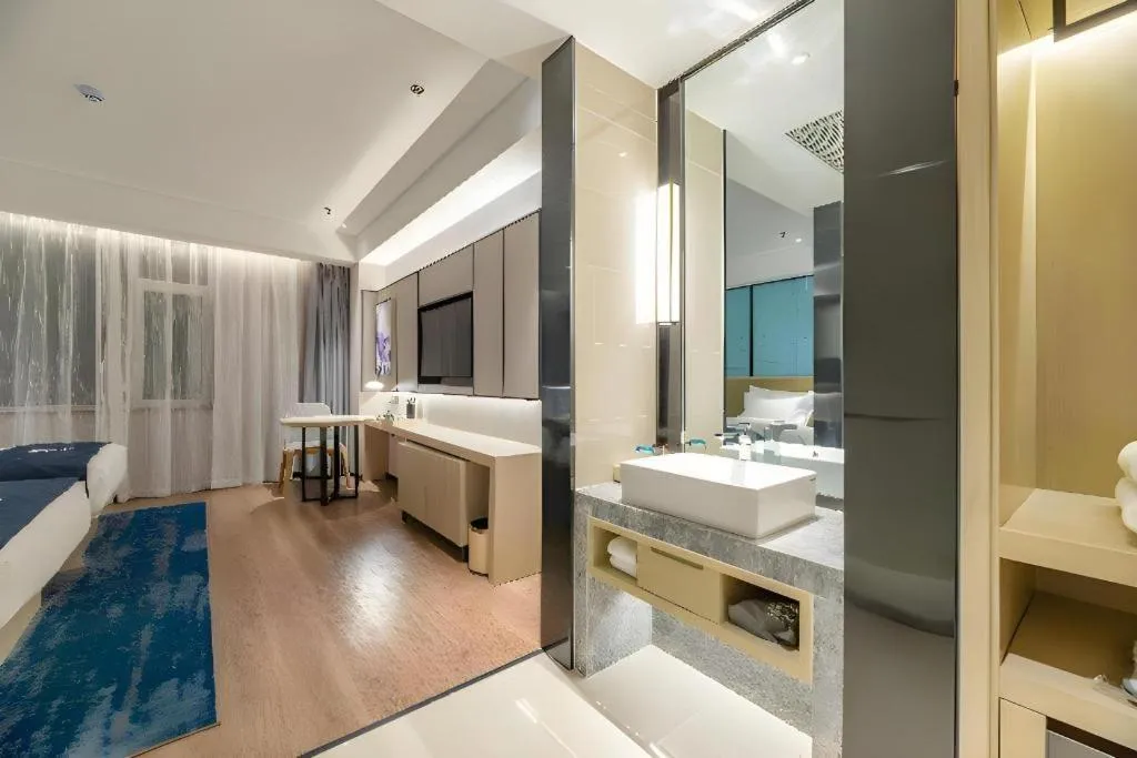 Bed in Echarm Hotel Tai'an Taishan Tianwai Village Hongmen