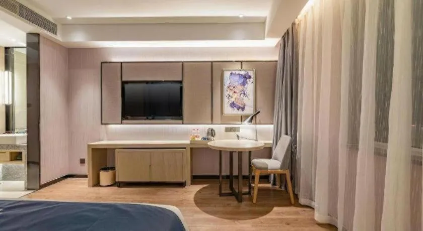 Bed in Echarm Hotel Tai'an Taishan Tianwai Village Hongmen