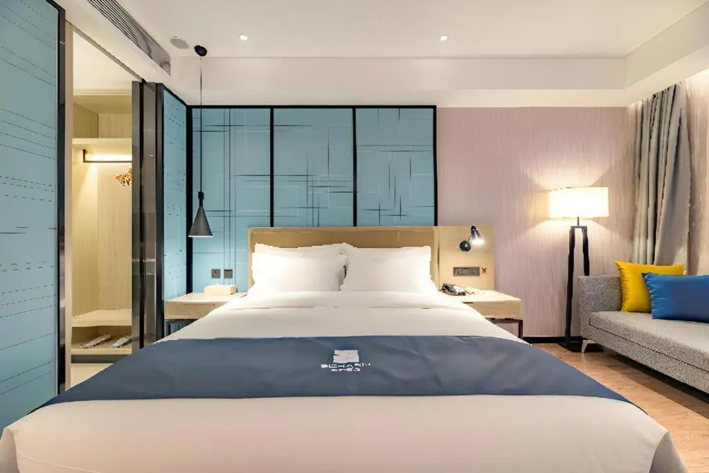 Bed in Echarm Hotel Tai'an Taishan Tianwai Village Hongmen