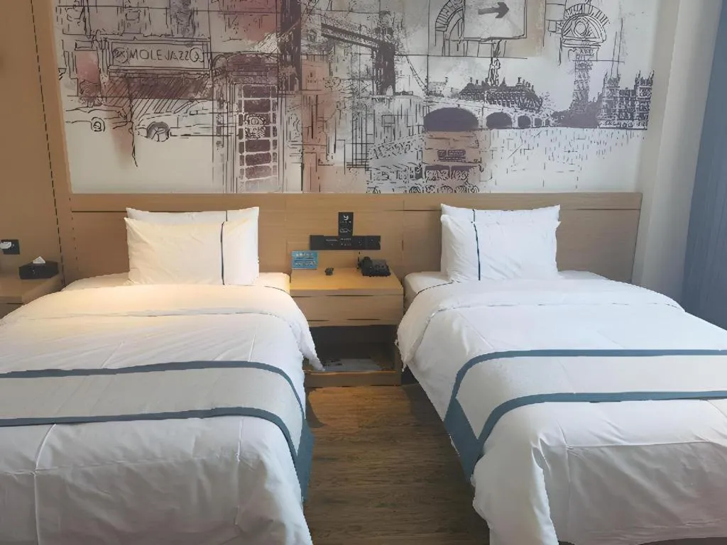 Bed in City Comfort Inn Shiyan Wudang Mountain