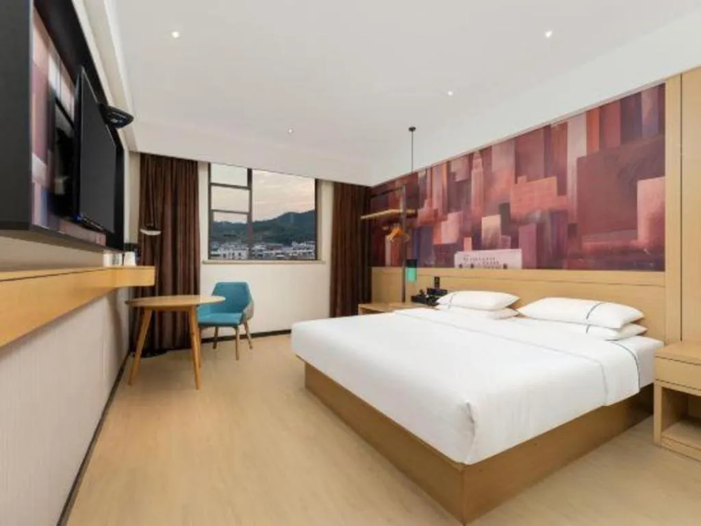 Bed in City Comfort Inn Shiyan Wudang Mountain