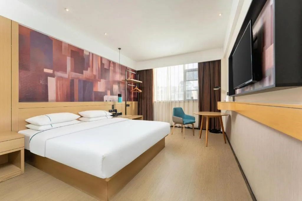 Bed in City Comfort Inn Shiyan Wudang Mountain